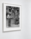 Man Beneath a Flag, Kolkata, India, 2017 — framed on wall