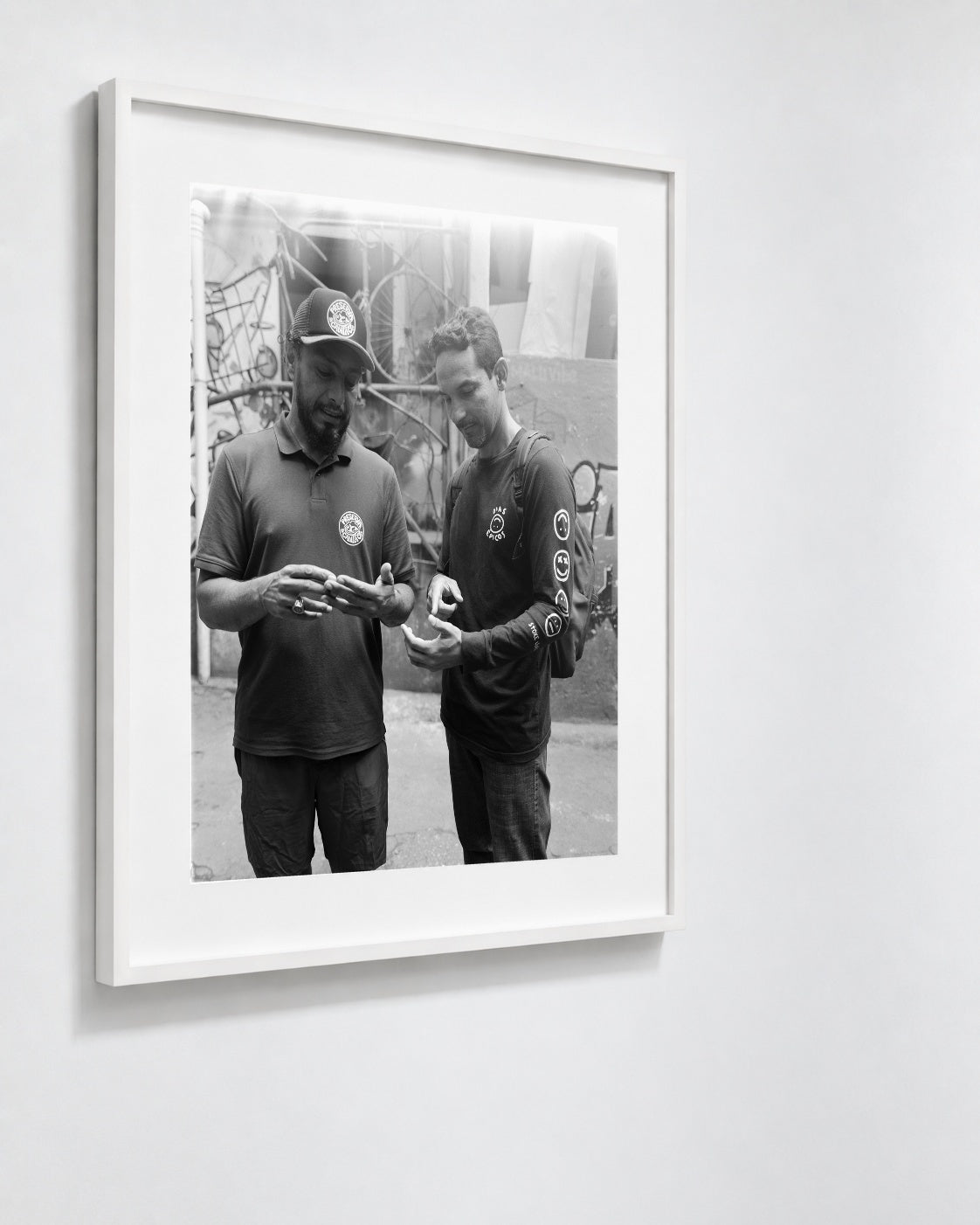 Marcio and Marcos, Rocinha, Brazil, 2025 — framed on wall